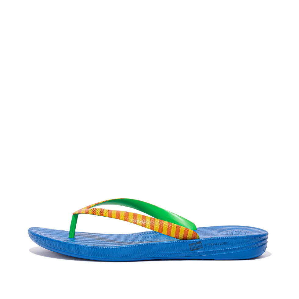 Fitflop Iqushion X Yinka Ilori رجل يتخبط باللون الأصفر والأحمر في حالة تأهب